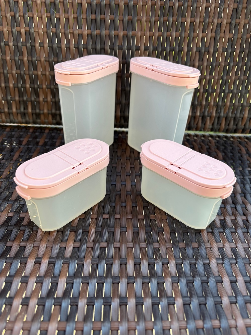 Vintage Tupperware Modular Mates Spice Containers with pink flip-top lids